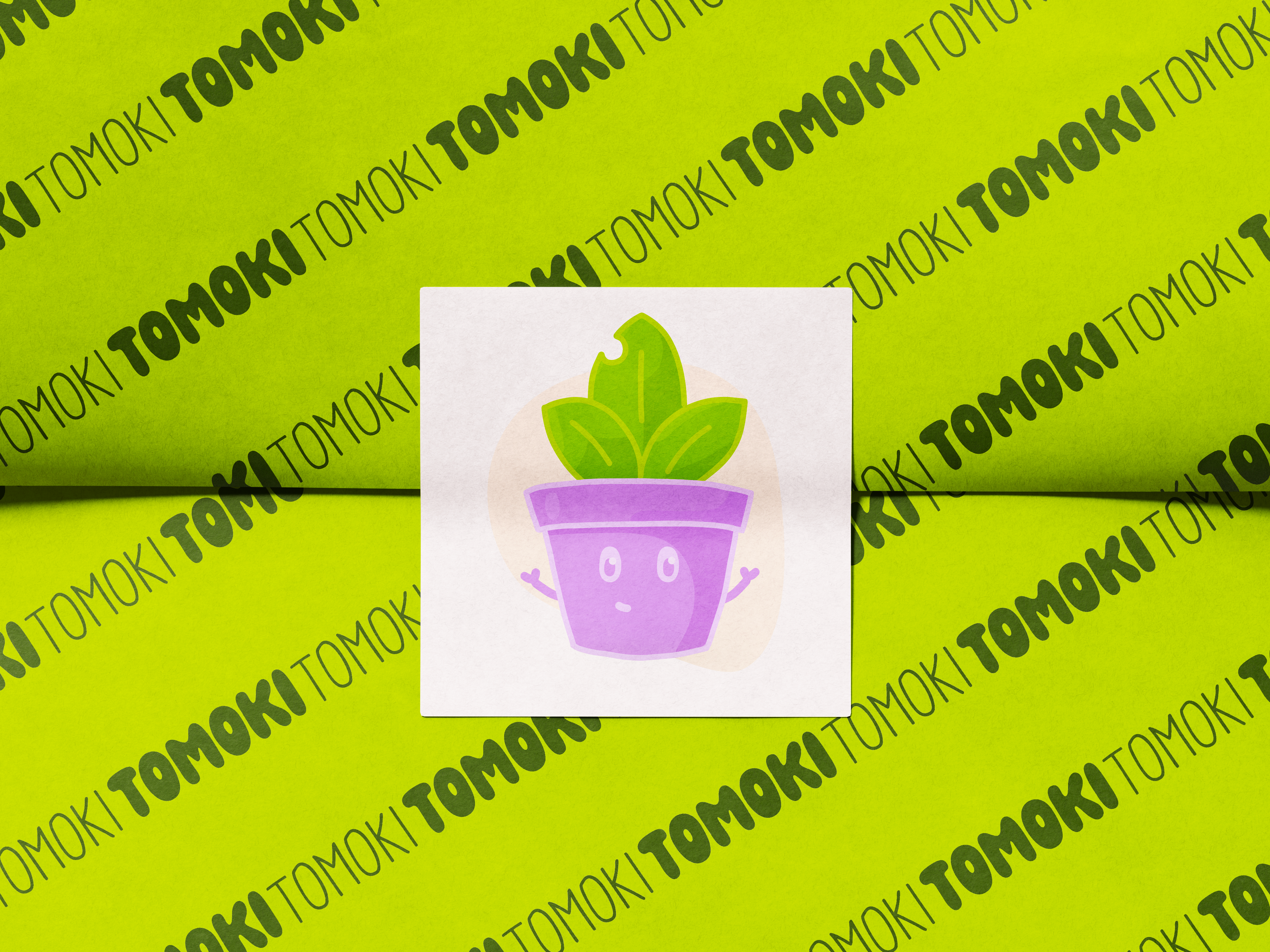 Mockup du sticker carré Tomoki, votre plante de compagnie interactive
